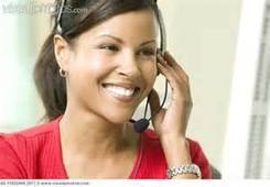 Woman smiling while wearing a headset
